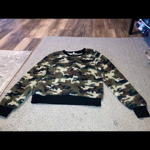 Long sleeve fuzzy camo shirt.